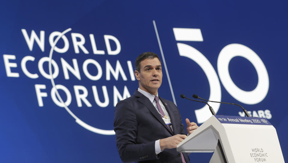 Spanish Prime Minister Pedro Sanchez delivers a speech at the World Economic Forum in Davos, Switzerland, Wednesday, Jan. 22, 2020. The 50th annual meeting of the forum is taking place in Davos from Jan. 21 until Jan. 24, 2020. (AP Photo/Markus Schreiber)