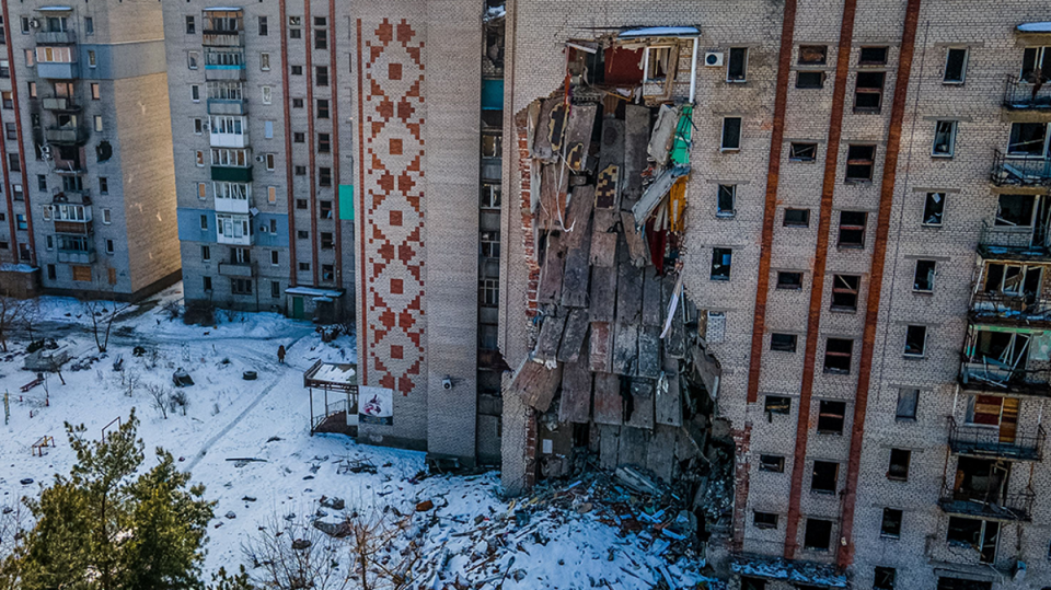 his aerial photograph shows a damaged residential building in the town of Lyman, Donetsk (IHOR TKACHOV/AFP via Getty Images)