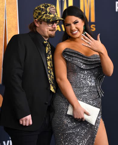 <p>Denise Truscello/Getty</p> Hardy and Caleigh Ryan attend the ACM Awards in March 2022 in Las Vegas