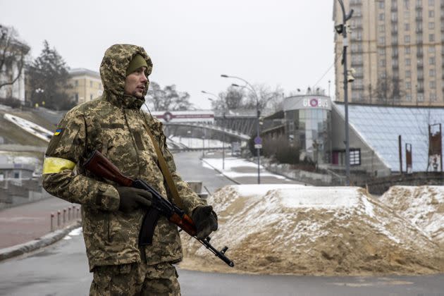 A soldier is seen around piles of sand used for blocking a road in Ukrainian capital, Kyiv amid Russian attacks on March 02, 2022.  (Photo: Anadolu Agency via Getty Images)