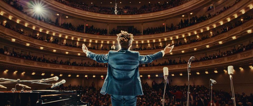 Jon Batiste salutes the Carnegie Hall crowd during his performance of his first orchestral symphony in "American Symphony."