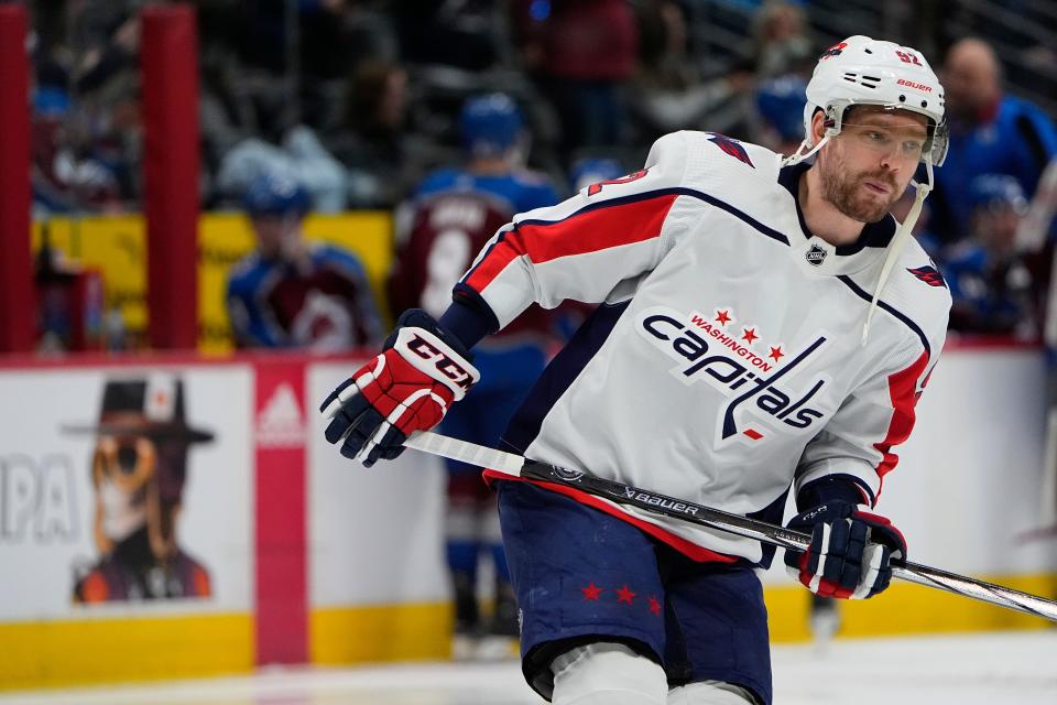 FILE - Washington Capitals center Evgeny Kuznetsov (92) skates in the second period of an NHL hockey game, Wednesday, Jan. 24, 2024, in Denver. Kuznetsov is entering the NHL/NHLPA player assistance program. The league and union announced Monday, Feb. 5, 2024, that Kuznetsov will be away from the team indefinitely while he receives care. (AP Photo/David Zalubowski, File)