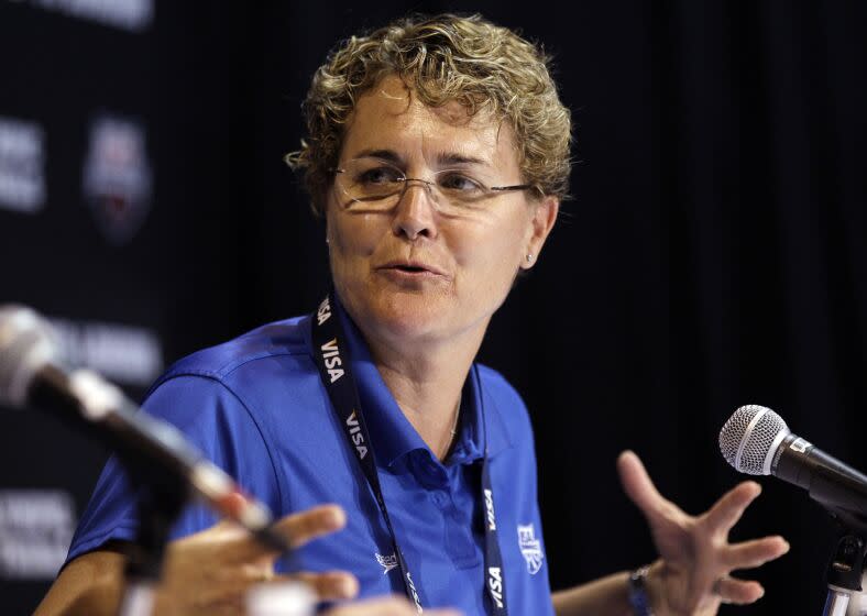 FILE -U.S. Olympic team head coach Teri McKeever speaks during a news conference at the U.S. Olympic swimming trials, Sunday, June 24, 2012, in Omaha, Neb. Longtime University of California women's swimming coach Teri McKeever was fired Tuesday, Jan. 31, 2023 following an investigation into alleged harassment, bullying and verbally abusive conduct, the school said in a statement. (AP Photo/Charlie Neibergall, File)