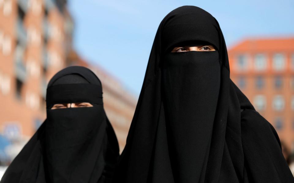 A doctor has been reported to the GMC for asking a patient to remove her veil during a constulation - REUTERS