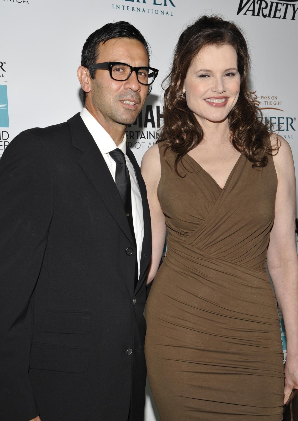 Geena Davis and Reza Jarrahy attend Heifer Internationals 2nd Annual “Beyond Hunger: A Place at the Table” to Help End World Hunger and Poverty at Montage Hotel on Sept. 19, 2013 in Los Angeles. (Photo by John Sciulli/Getty Images for Heifer International)