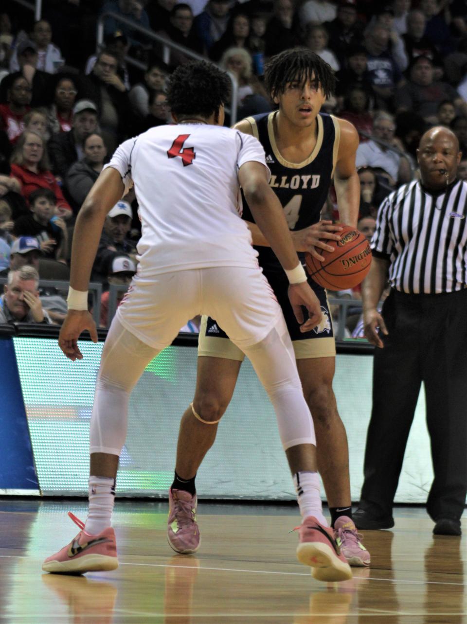 Lloyd's E.J. Walker (with ball) and Newport's James Turner are two of the top returning players in Northern Kentucky.