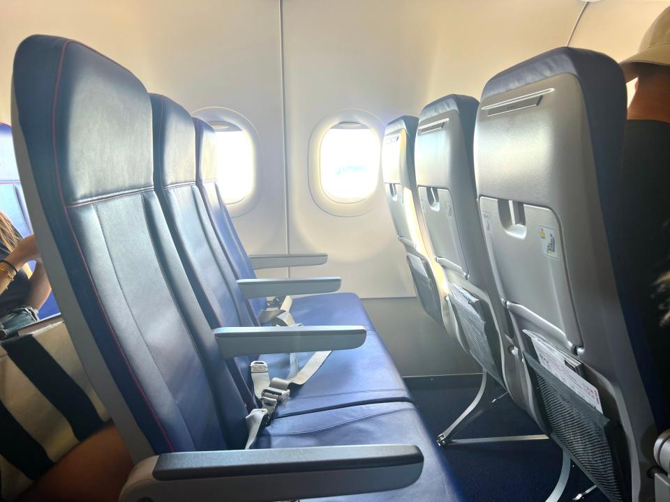 An empty row of seats on board a Wizz Air Airbus A321neo.