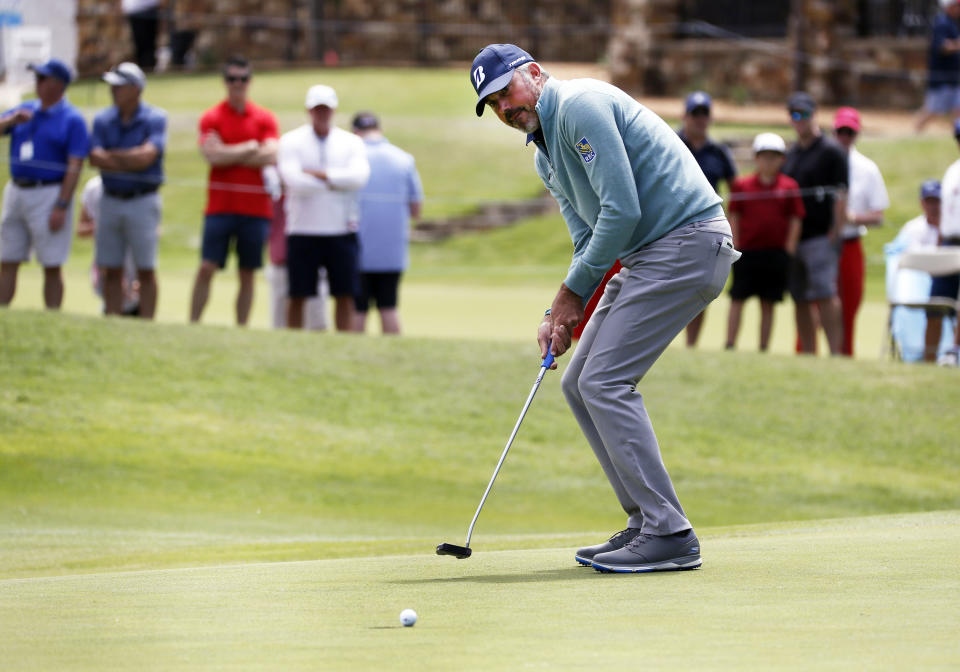 Matt Kuchar reacts as he misses a birdie putt on the 18th green during the second round of the AT&T Byron Nelson golf tournament in McKinney, Texas, Friday, May 14, 2021. (AP Photo/Ray Carlin)