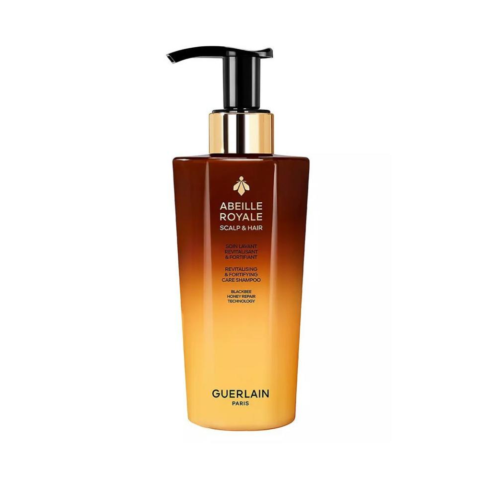 <p><a href="https://www.guerlain.com/us/en-us/p/abeille-royale-revitalizing-fortifying-care-shampoo-P061886.html" rel="nofollow noopener" target="_blank" data-ylk="slk:Shop Now;elm:context_link;itc:0;sec:content-canvas" class="link ">Shop Now</a></p><p>Revitalizing & Fortifying Care Shampoo</p><p>guerlain.com</p><p>$82.00</p>