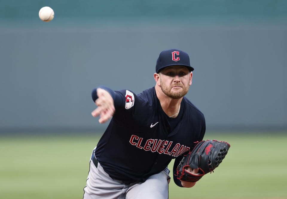 Cleveland Guardians pitcher Ben Lively throws to a Kansas City Royals batter during the first inning of a baseball game in Kansas City, Mo., Thursday, June 27, 2024. (AP Photo/Colin E. Braley)