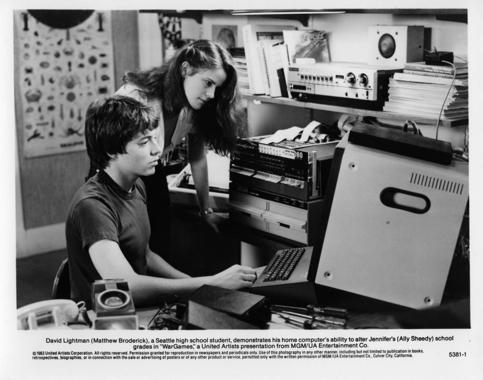 CIRCA 1983: Ally Sheedy watches  Matthew Broderick  computer in a scene for the MGM/UA movie  "WarGames" circa 1983. (Photo by Hulton Archive/Getty Images)