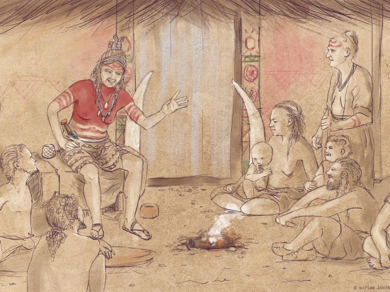 An illustration of a woman in red paint speaking to a group of people in a room with a smoldering fire in the center