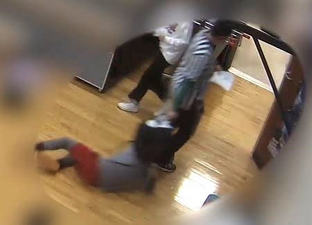 <strong><em>A still image from a video showing Nicole Horne dragging a student out of the East Side Elementary gym on Nov. 13, 2023. (Elizabethton City Schools) </em></strong>