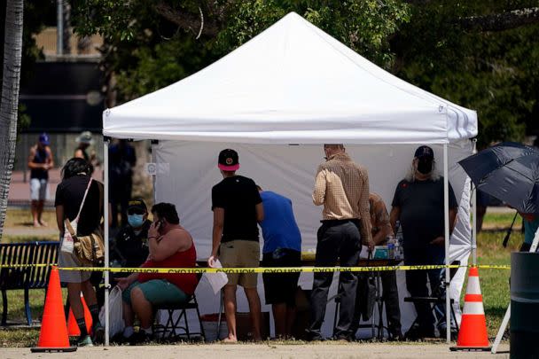 PHOTO: People line up at a monkeypox vaccination site, July 28, 2022, in Encino, Calif. (Marcio Jose Sanchez/AP)