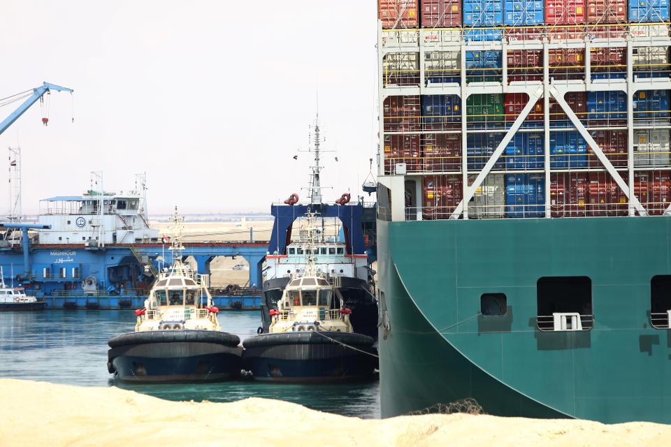 CAIRO, March 26, 2021 -- Rescue vessels work at the site of a container ship trapped on the Suez Canal of Egypt on March 26, 2021. The Suez Canal Authority SCA said on Friday that it welcomes cooperation with the United States in dislodging the giant cargo ship that has blocked the course of the world's busiest waterway since Tuesday, according to a statement released by the SCA. The SCA also expressed gratitude for all the other offers of assistance to free the ship, reiterating its keenness to restore maritime traffic in the Suez Canal as soon as possible. (Photo by Ahmed Gomaa/Xinhua via Getty) (Xinhua/Ahmed Gomaa via Getty Images)