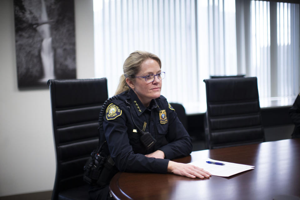 In this Jan. 23, 2020 photo Portland Police Chief Jami Resch speaks during an interview. Portland, Oregon, a liberal city with a reputation for large and frequent protests, is reeling from the nightly chaos that has overwhelmed its streets. For almost a week, smaller groups of demonstrators have broken off from peaceful protests that attracted thousands. More than 100 people have been arrested and police Chief Jami Resch on Wednesday, June 3, 2020 pleaded with residents to help stop those “who are holding our city with violence.” (Beth Nakamura/The Oregonian via AP)