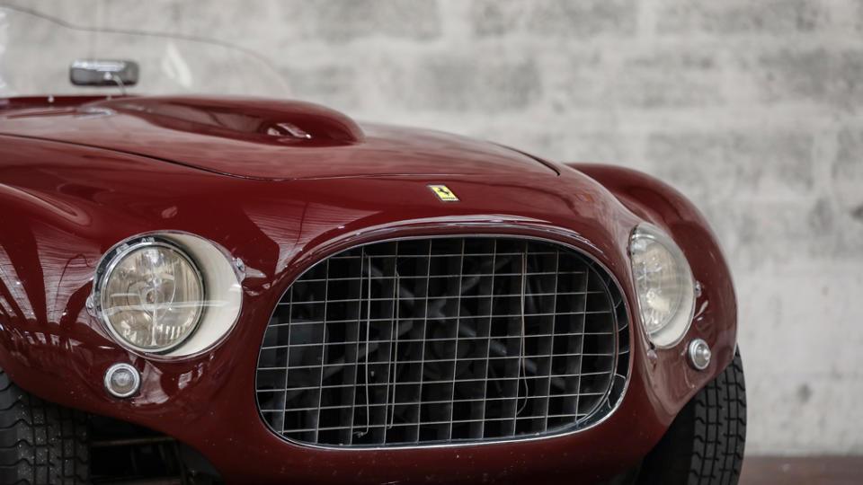 A close-up of the front grille on a 1953 Ferrari 250 MM Spider Series II.