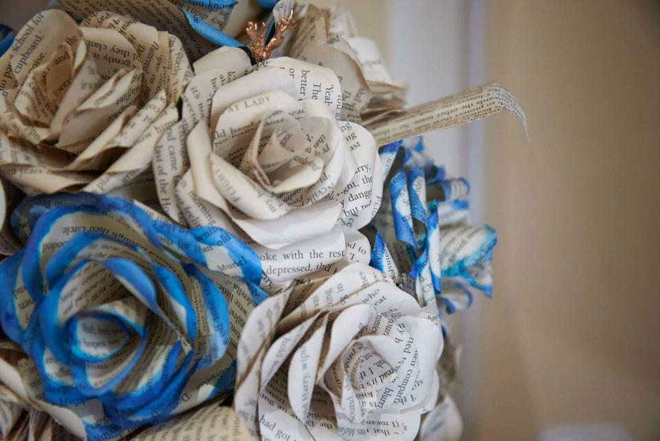 Their friends and family spent a year making paper roses from the pages of Harry Potter books. (Supplied)