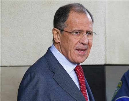 Russia's Foreign Minister Sergei Lavrov leaves for a break at the Intercontinental hotel where talks are being held in Geneva November 23, 2013. REUTERS/Denis Balibouse