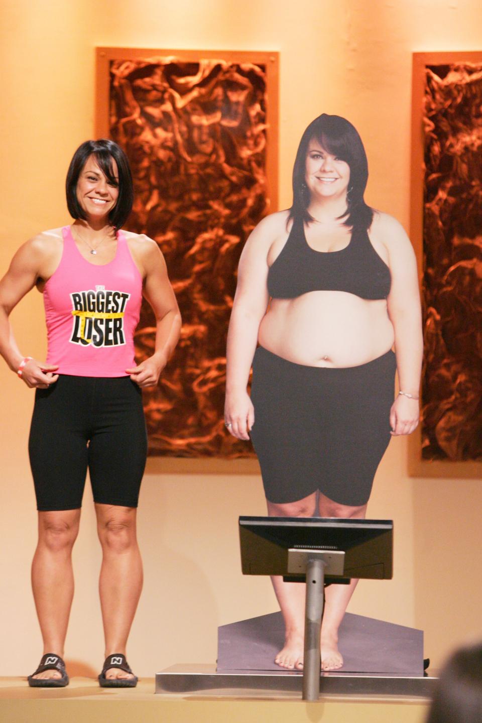 Ali Vincent during the Biggest Loser season finale standing next to her "before" picture. (Photo: Trae Patton/NBCU Photobank)