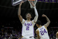 LSU guard Eric Gaines (2) and forward Shareef O'Neal (24) celebrate taking the lead during the second half of an NCAA college basketball game against Texas A&M in Baton Rouge, La., Wednesday, Jan. 26, 2022. (AP Photo/Matthew Hinton)