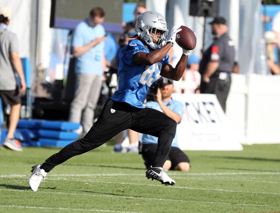 Lions receiver Kalil Pimpelton goes through passing drills.