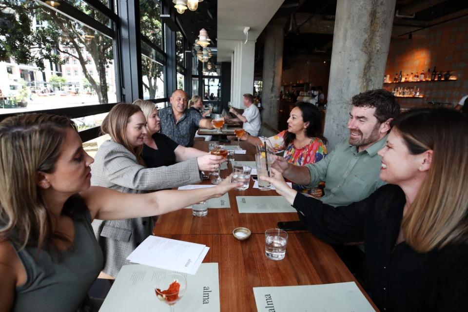 Guests enjoy lunch at Auckland’s Alma Restaurant on Friday  (Getty Images)