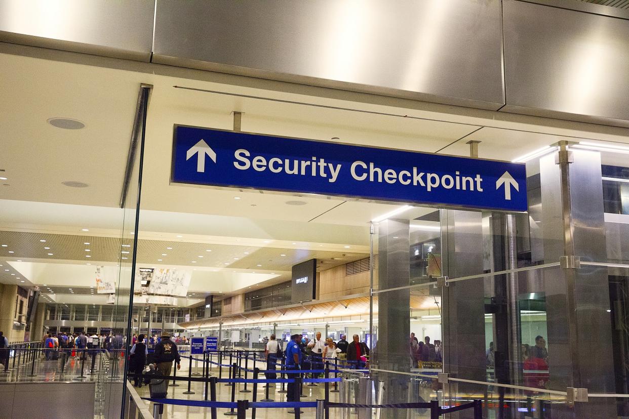 Security checkpoint sign in an airport