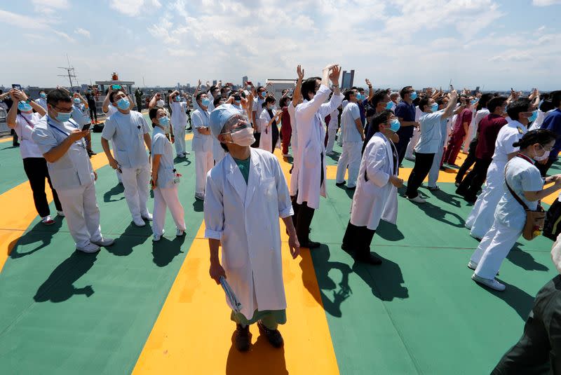 Japan Air Self-Defense Force stages a flyover to salute the medical workers at the frontline of the fight against the coronavirus disease (COVID-19), in Tokyo