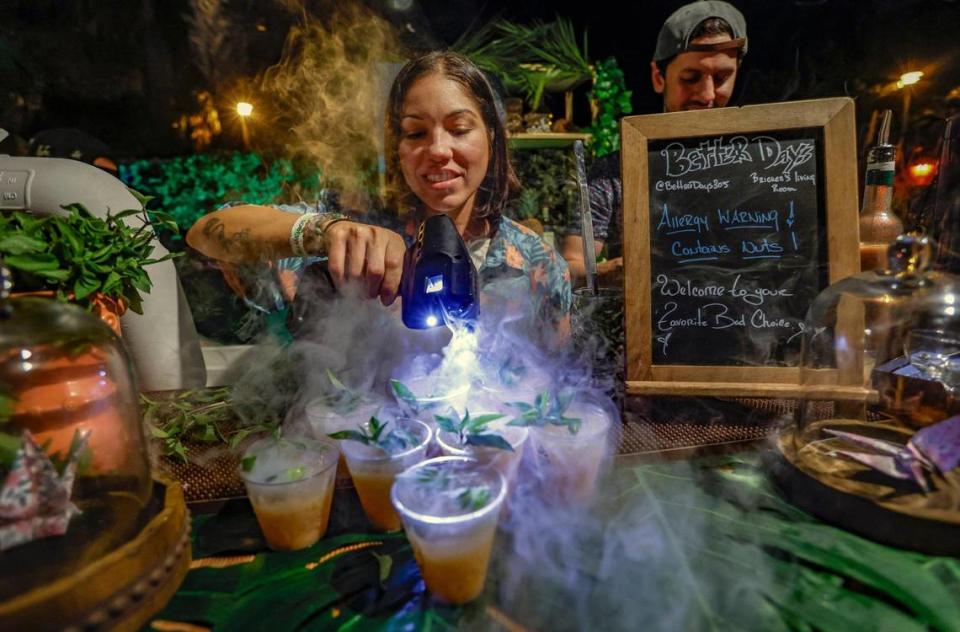 Lexi Tollinchi, with Better Days, prepares cocktails during the Art of Tiki Cocktail Showdown at the 2023 South Beach Wine & Food Festival at the Kimpton Surfcomber Hotel in Miami Beach.