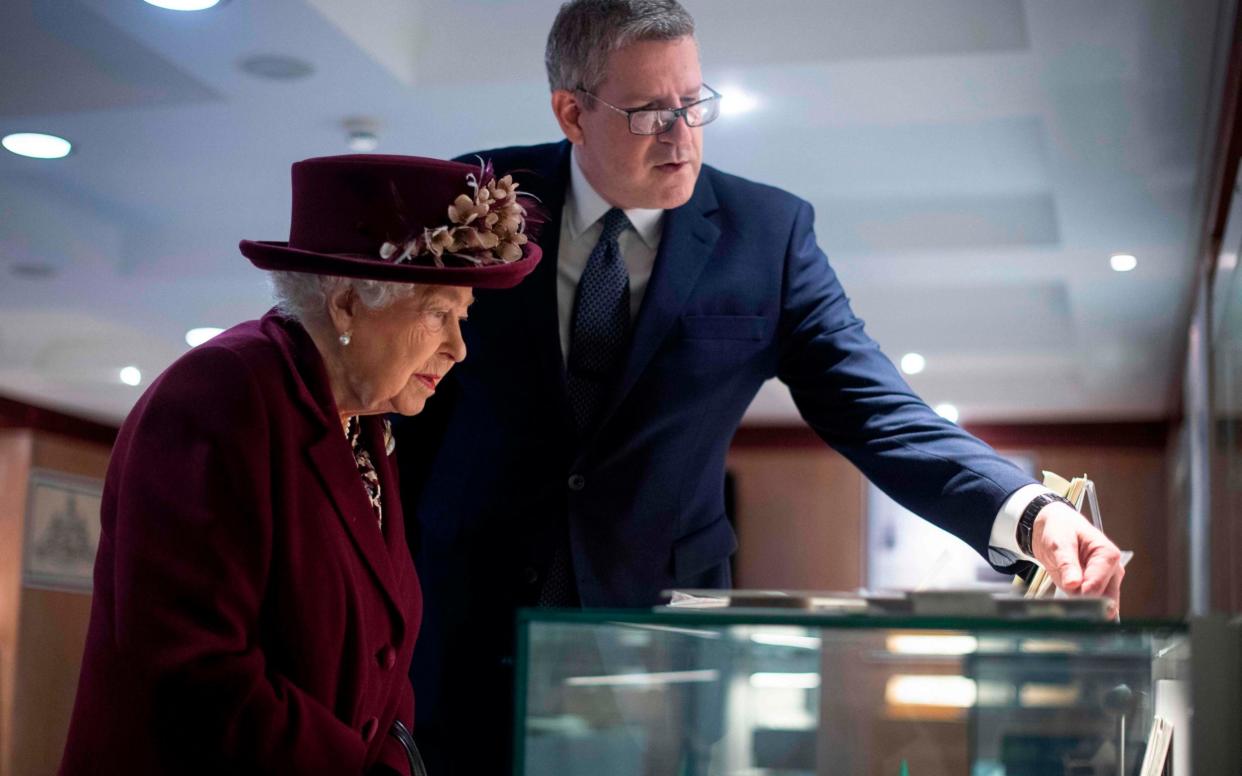 The Queen with Lord Parker. - AFP