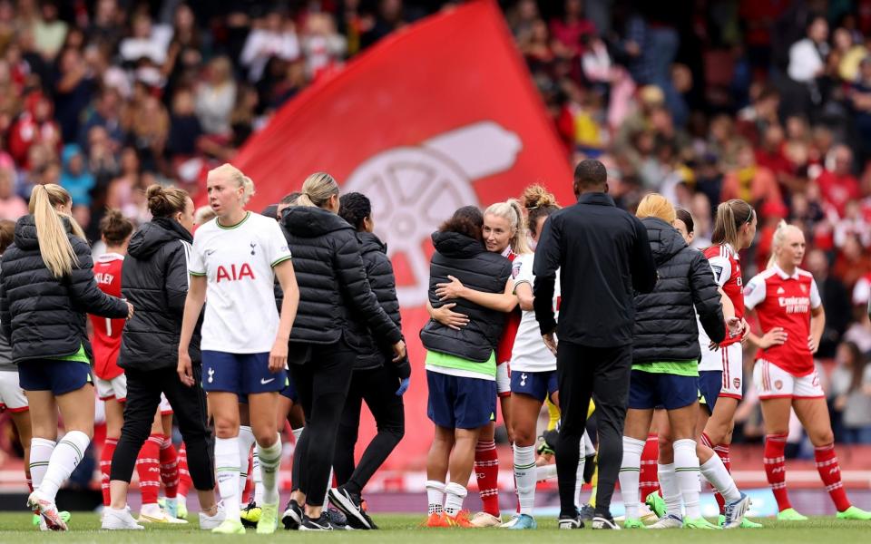 Leah Williamson of Arsenal and Drew Spence of Tottenham Hotspur interact following the FA Women's Super League match between Arsenal and Tottenham Hotspur - The FA Collection