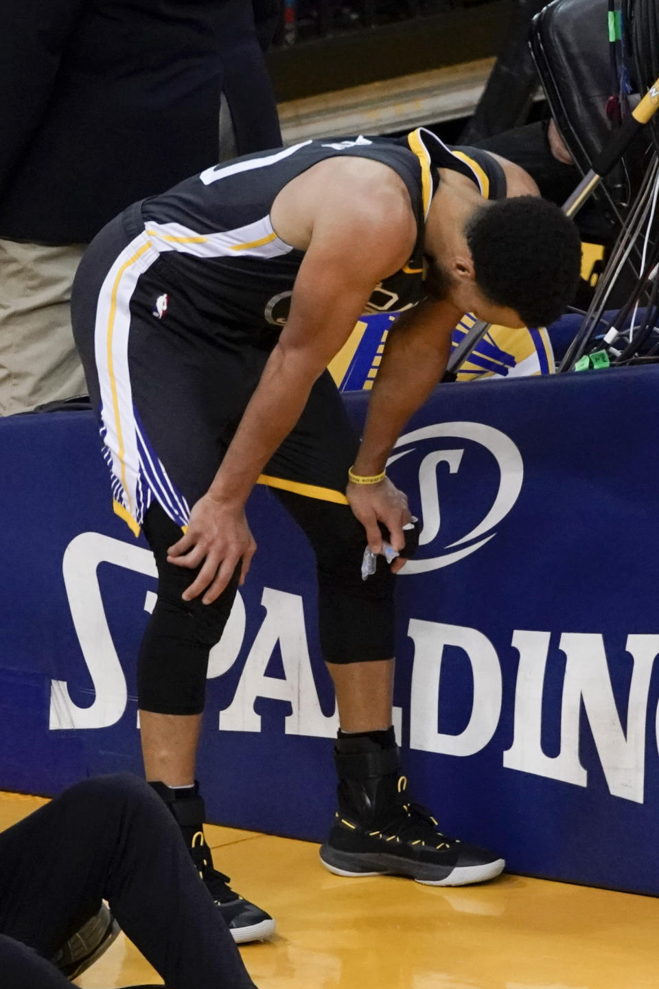 Golden State Warriors guard Stephen Curry reacts during the second half of Game 4 of basketball's NBA Finals against the Toronto Raptors in Oakland, Calif., Friday, June 7, 2019. (AP Photo/Tony Avelar)