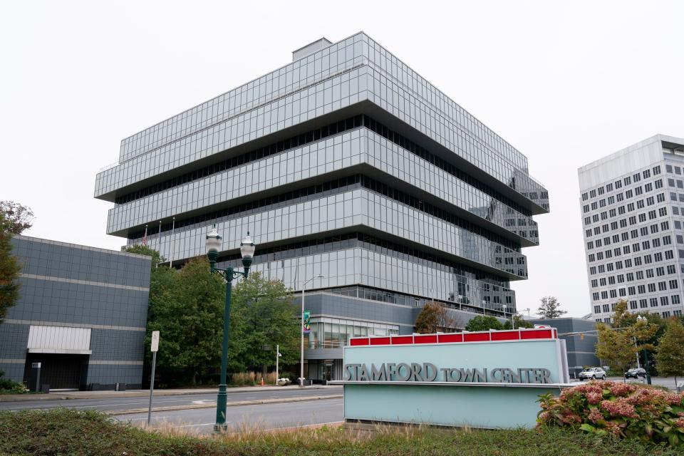 This Oct. 21, 2020 photo shows Purdue Pharma headquarters in Stamford, Connecticut.  The Justice Department said Purdue Pharma, the company that makes OxyContin, will plead guilty to three federal criminal charges as part of a settlement of more than $8 billion. OxyContin is the powerful prescription painkiller that experts say helped touch off an opioid epidemic. (AP Photo/Mark Lennihan) ORG XMIT: CTML101