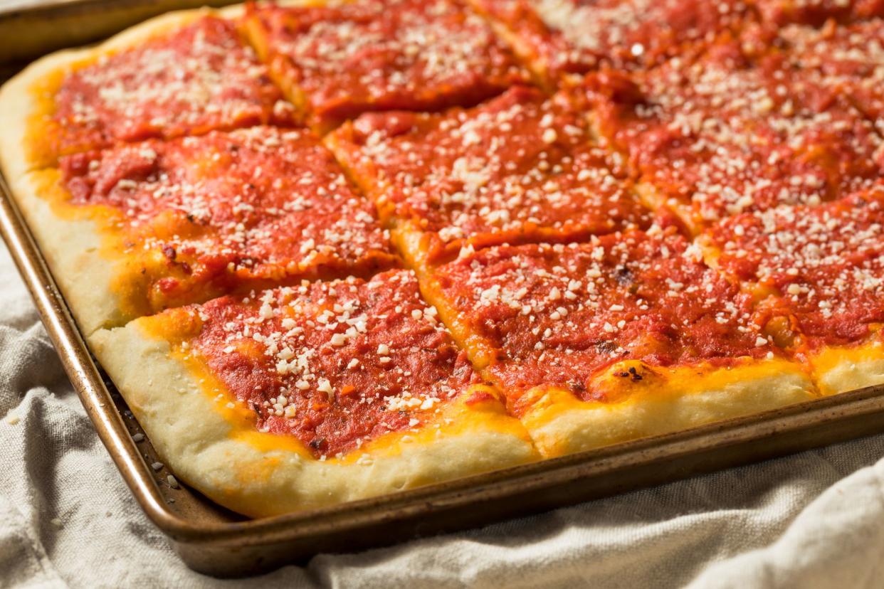 <p><br></p><p>If you head to Philly and visit any of the city’s classic old Italian bakeries, you’ll discover a close relative of pizza that can only be found in and around the City of Brotherly Love: the <a href="https://www.goldbelly.com/foods/tomato-pie" rel="nofollow noopener" target="_blank" data-ylk="slk:tomato pie;elm:context_link;itc:0;sec:content-canvas" class="link rapid-noclick-resp">tomato pie</a>. These pies are light, airy, crisp, and served at room temperature, and they’re topped with a sweet homemade tomato sauce and a sprinkling of Romano cheese instead of mozzarella. <a href="https://www.goldbelly.com/restaurants/corropolese-italian-bakery-and-deli" rel="nofollow noopener" target="_blank" data-ylk="slk:Corropolese Bakery;elm:context_link;itc:0;sec:content-canvas" class="link rapid-noclick-resp">Corropolese Bakery</a> has been serving one of the city’s most iconic tomato pies since 1924, and <a href="https://www.goldbelly.com/restaurants/iannellis-bakery" rel="nofollow noopener" target="_blank" data-ylk="slk:Iannelli’s Bakery;elm:context_link;itc:0;sec:content-canvas" class="link rapid-noclick-resp">Iannelli’s Bakery</a> has been a local landmark since 1910.</p><span class="copyright"> bhofack2/Istockphoto </span>