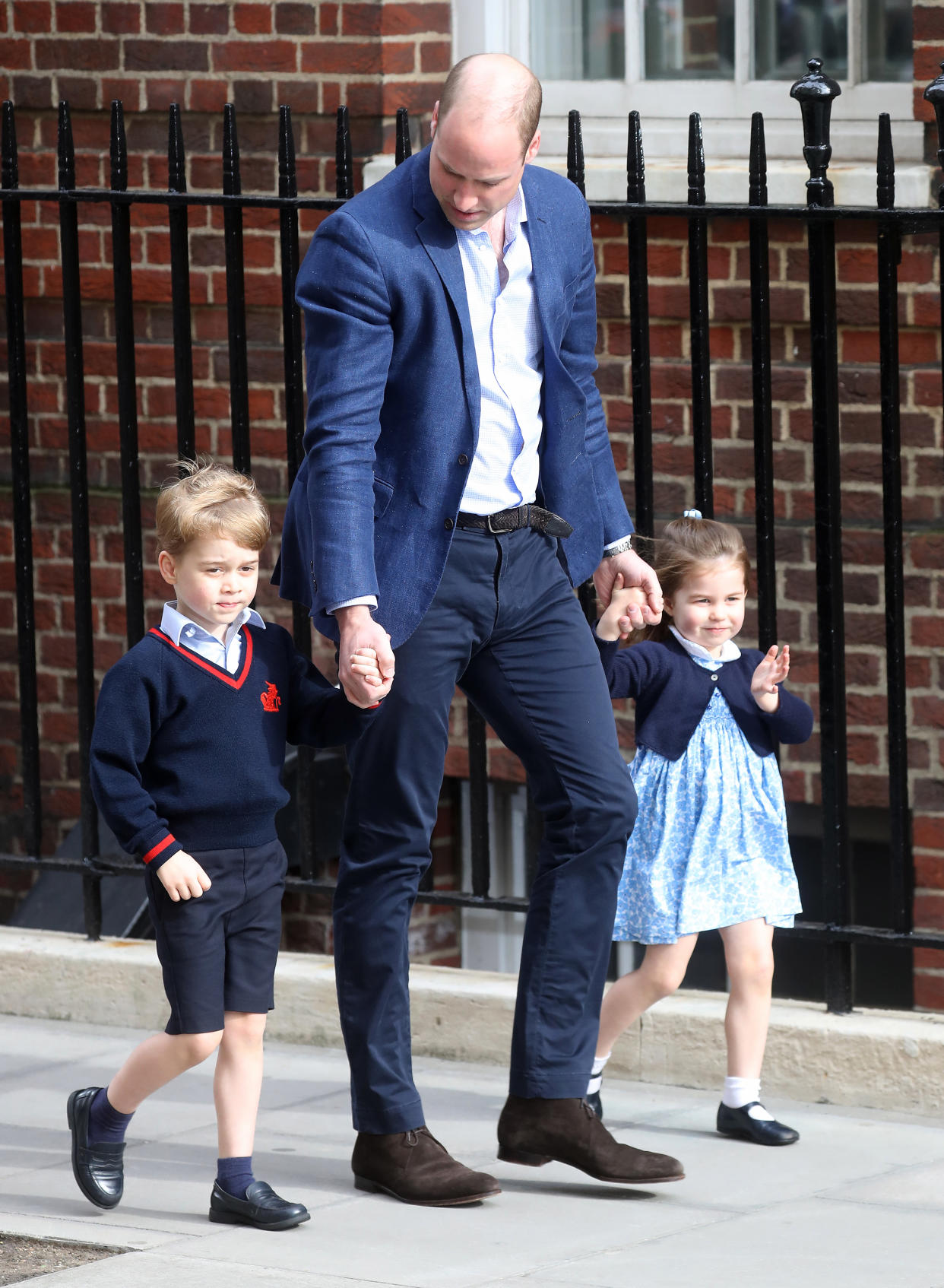 Prince William, Duke of Cambridge arrives with Prince George and Princess Charlotte at the Lindo Wing after Louis’ birth. [Photo: Getty]