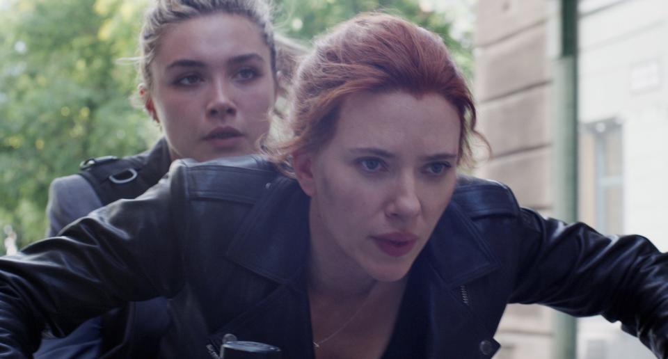 Florence Pugh and Scarlett Johansson ride a motercycle