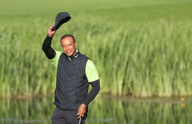 Tiger Woods waves to fans on the 18th green at the JP McManus Pro-Am 