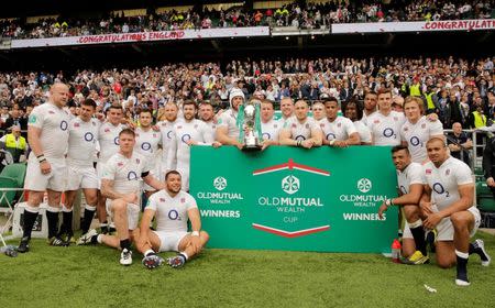 Britain Rugby Union - England v Wales - Old Mutual Wealth Cup - Twickenham Stadium, London, England - 29/5/16 England's Dylan Hartley celebrates with the trophy and team mates after the game Action Images via Reuters / Henry Browne Livepic EDITORIAL USE ONLY.