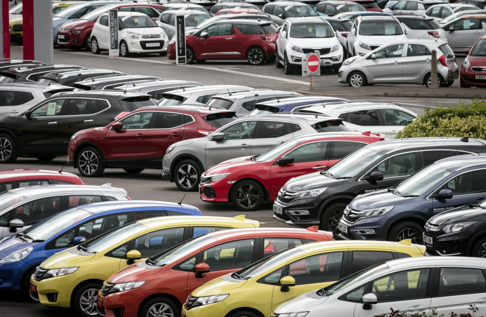 WESTON-SUPER-MARE, ENGLAND - SEPTEMBER 14:  New and nearly new cars are displayed for sale on a forecourt of a car dealership on September 14, 2017 in Weston-super-Mare, England. Over 80 percent of new cars in the UK are currently financed through personal contract plans (PCPs), which last year led to over £30bn in car loans. A number of economists have raised concerns that consumer debt levels in the UK are at a dangerously high level and fear it could help spark another credit-crunch financial crash, similar to what happened ten years ago in 2007.  (Photo by Matt Cardy/Getty Images)