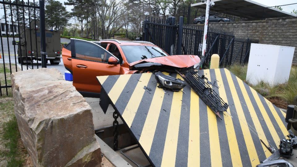 A photo shows the aftermath of a vehicle's crash with the "final denial barrier" at the FBI's Atlanta field office on Monday, April 1. - United States District Court Northern District of Georgia