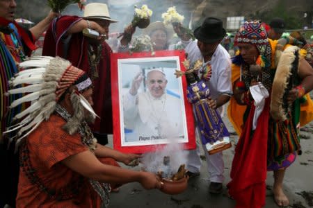 Peruvian shamans perform a ritual prior to the arrival of Pope Francis to Peru, at Pescadores beach in Chorrillos, Lima, Peru, January 17, 2018. REUTERS/Guadalupe Pardo