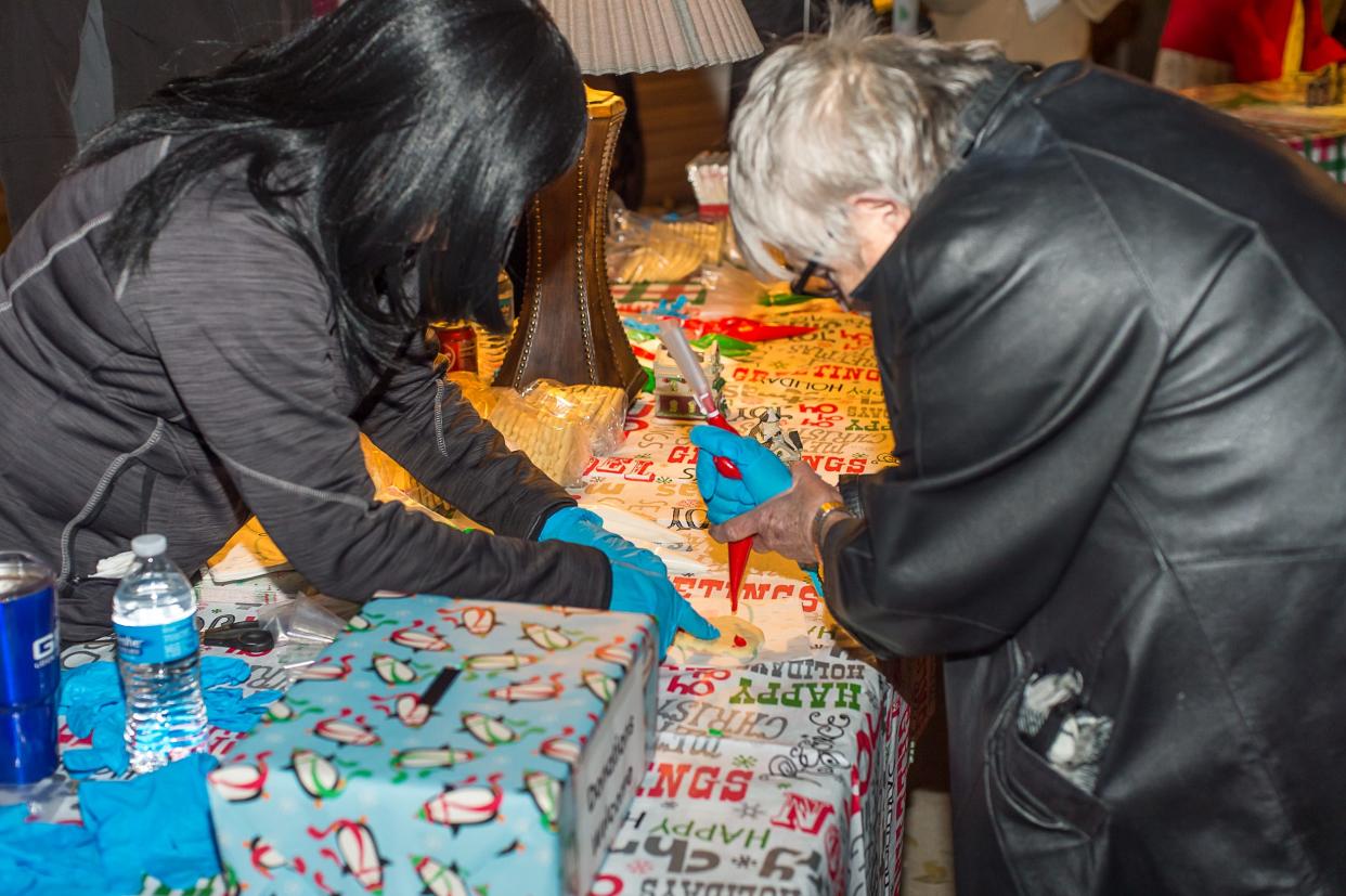 Another Chance House hosts its Home for Christmas event with cookie decorating, a choir, storytelling and Mr. and Mrs. Claus along with food trucks around the properties.