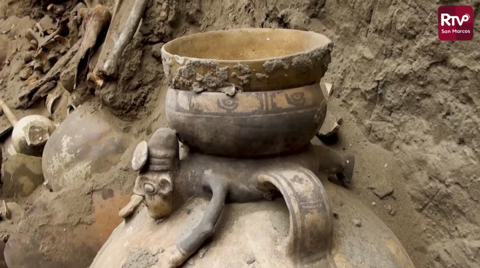 An intricate pottery vessel found in the tomb.