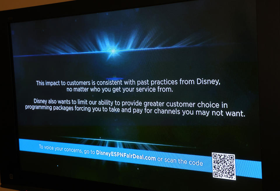 LOS ANGELES, CALIFORNIA - SEPTEMBER 06: In this photo illustration, a blue screen message is displayed with QR code on Spectrum TV over the ESPN channel amid a dispute between Disney and Charter Spectrum on September 6, 2023 in Los Angeles, California. Walt Disney Co. has pulled channels including ESPN and ABC from the Charter Spectrum cable TV service over a fees dispute. (Photo Illustration by Mario Tama/Getty Images)