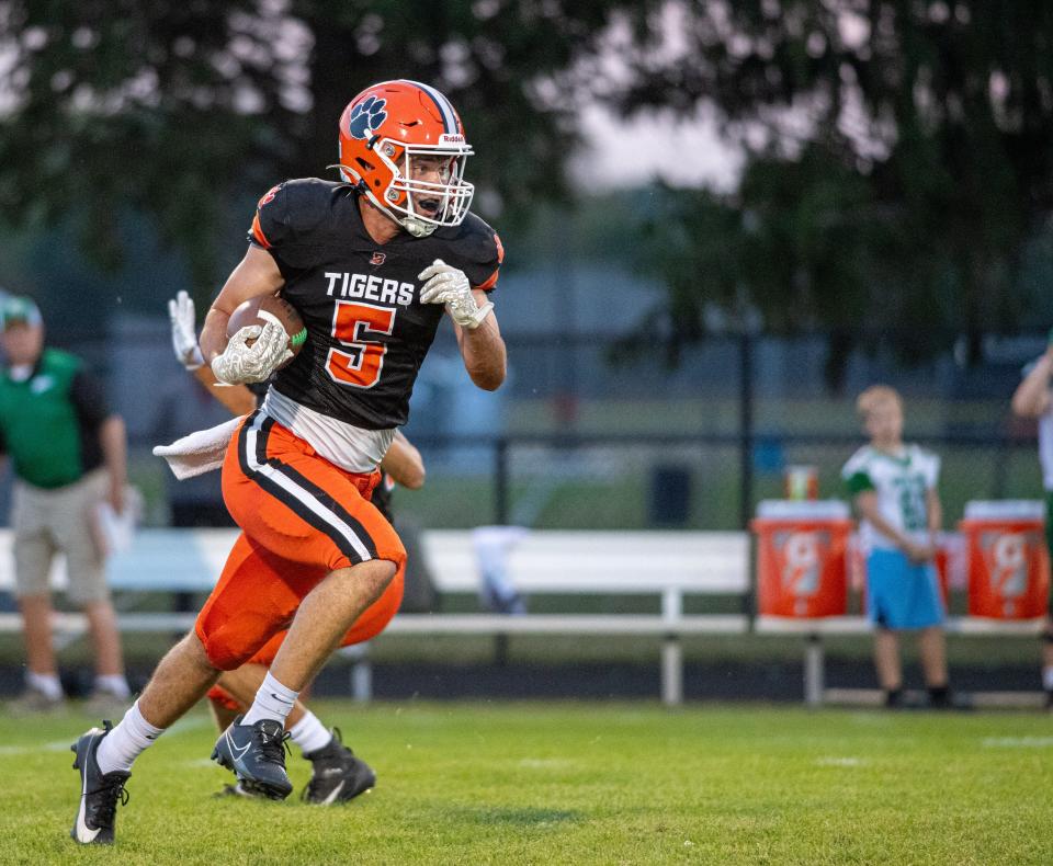 Byron's Ashton Henkel returns a North Boone punt to put Byron in scoring position in the first quarter of their game on Friday, Sep. 15, 2023 in Byron.