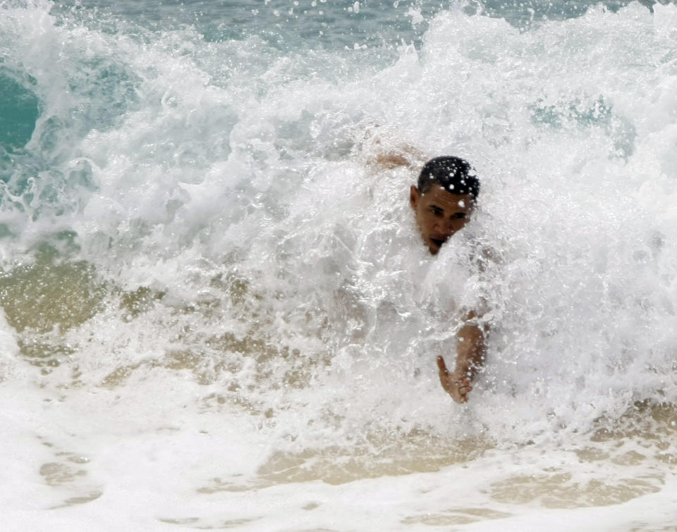 Ok, so he wasn't President yet, but this is no way to get yourself elected. Obama "rides" a wave in Hawaii in August 2008.  (AP Photo/Alex Brandon, File)