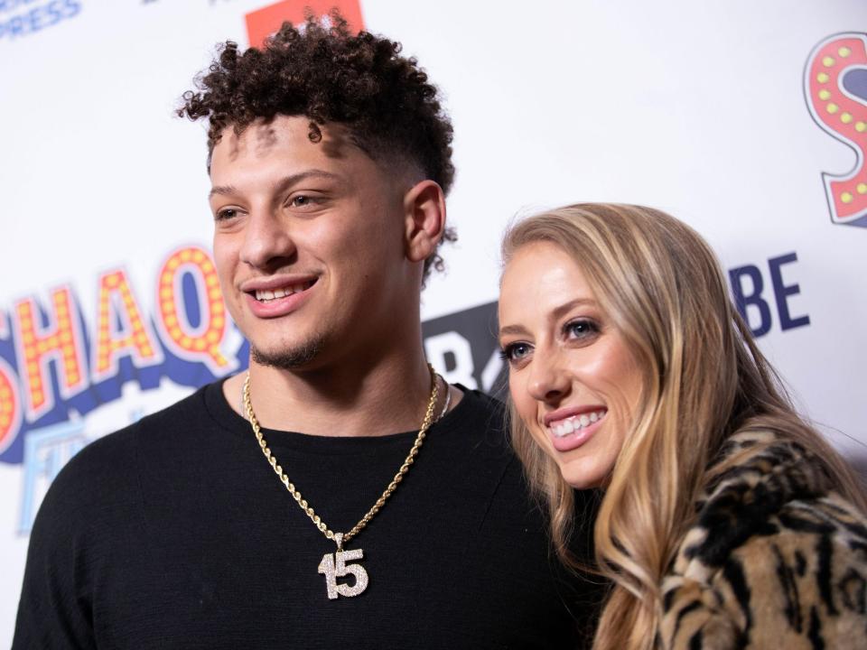 Patrick Mahomes and Brittany Matthews attend a red carpet.
