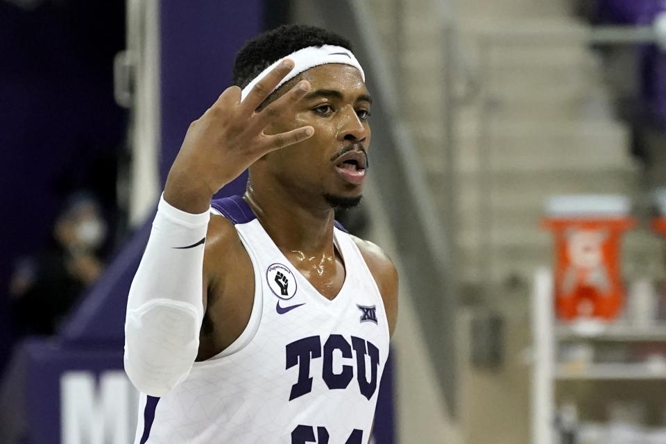 TCU forward Kevin Easley celebrates a 3-point basket during the second half of the team's NCAA college basketball game against North Dakota State in Fort Worth, Texas, Tuesday, Dec. 22, 2020. (AP Photo/Tony Gutierrez)