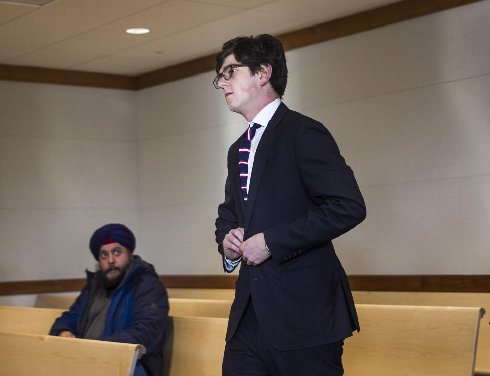 Owen Labrie arrives at Merrimack County Superior Court for his amended sentence hearing, Tuesday, Dec. 18, 2018, in Concord, N.H. A judge has refused to shorten the jail term for Labrie, a New Hampshire prep school graduate convicted of sexually assaulting a 15-year-old classmate in 2015, saying he has to report to jail for the remaining 10 months of his sentence the day after Christmas. (Geoff Forester/The Concord Monitor via AP, Pool)